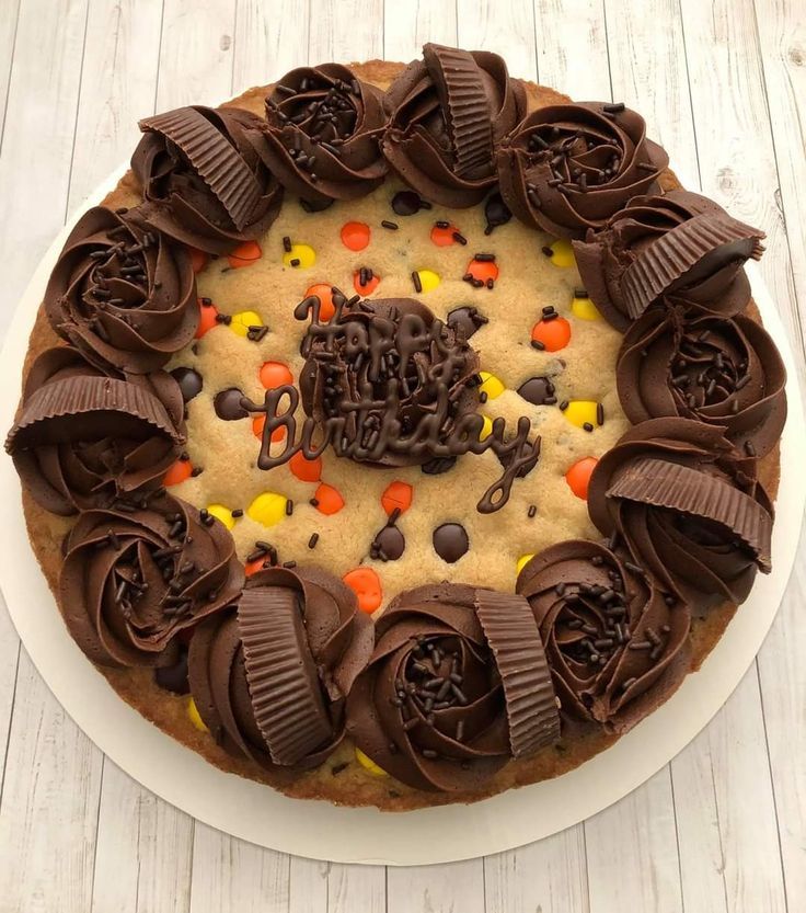 Irresistible Birthday Cookie Cake: Soft Base, Colorful Accents, and Decadent Chocolate Frosting.