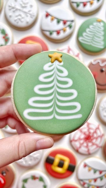 Whimsical Green Christmas Tree Cookie Decorated with a Cheerful Star and Holiday-Themed Companions