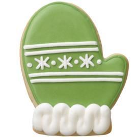 Whimsical Mitten-Shaped Cookies Decorated with Green Frosting and White Winter Patterns for Festive Celebrations.