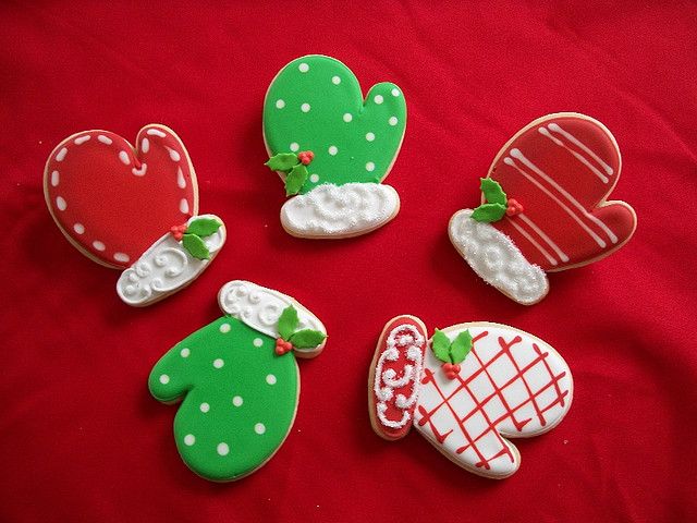 Cheerful Festive Mitten-Shaped Cookies with Vibrant Icing for Holiday Celebrations.