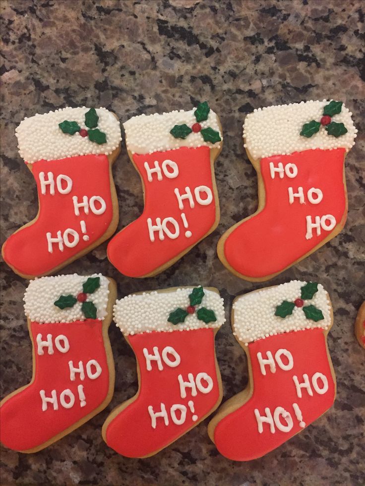 Cheerful Christmas Stocking Cookies with Vibrant Icing and Holly Accents