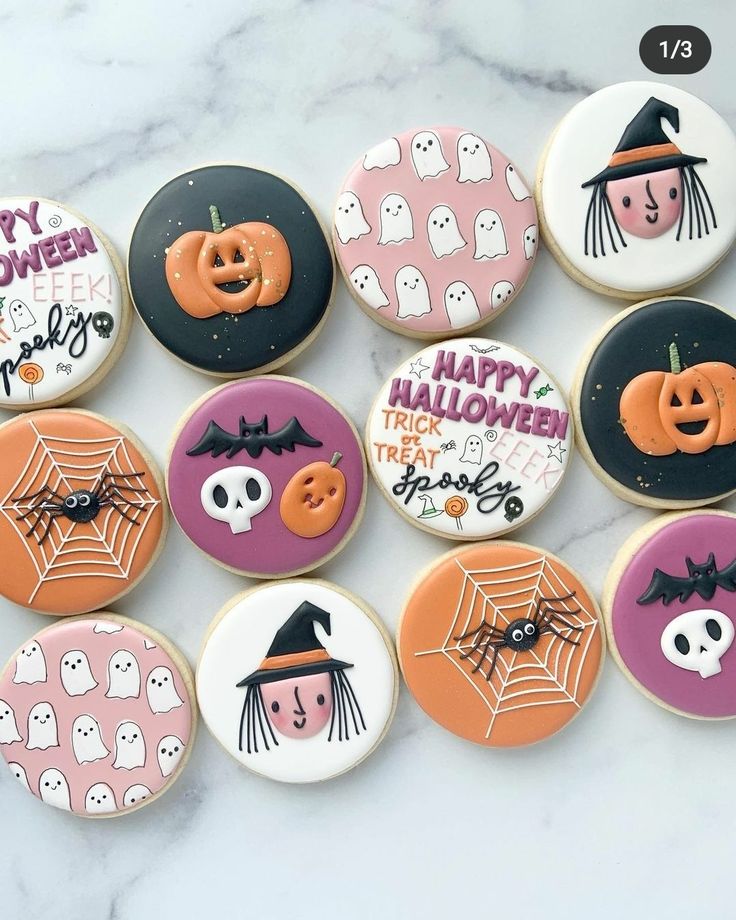 Festive Halloween Cookies with Colorful Designs and Spooky Charm.