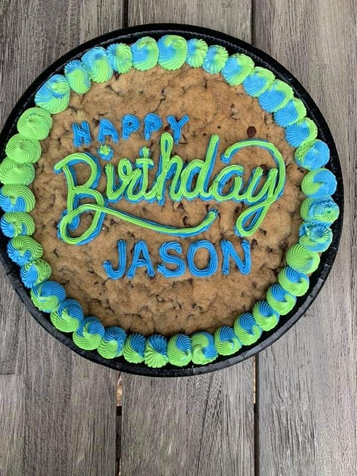 Vibrant Birthday Cookie Cake with Festive Frosting and Playful Patterns.