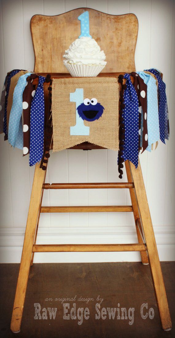 Whimsical Cookie Monster-Themed High Chair Decoration for First Birthday Celebration