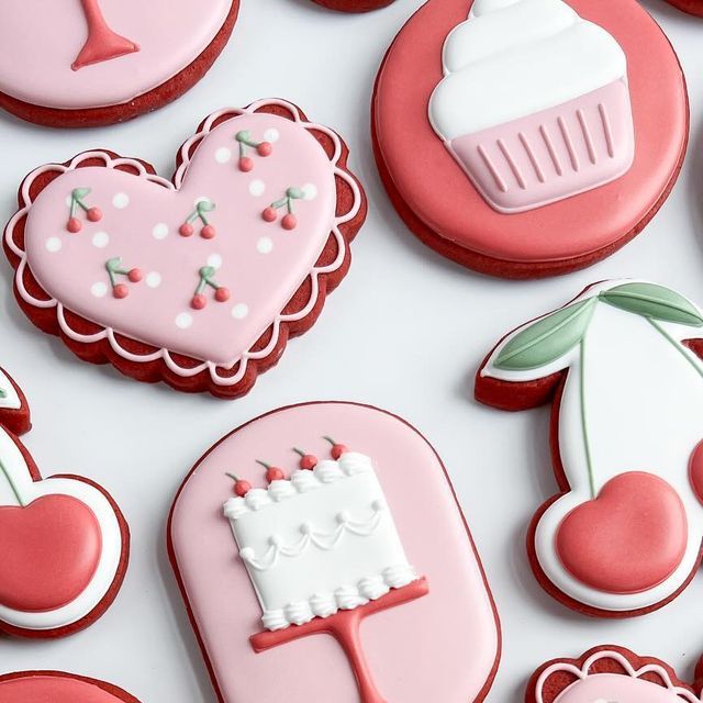 Playful Pastel Pink Cookie Designs: Whimsical Treats for Festive Celebrations and Nail Art Inspiration.