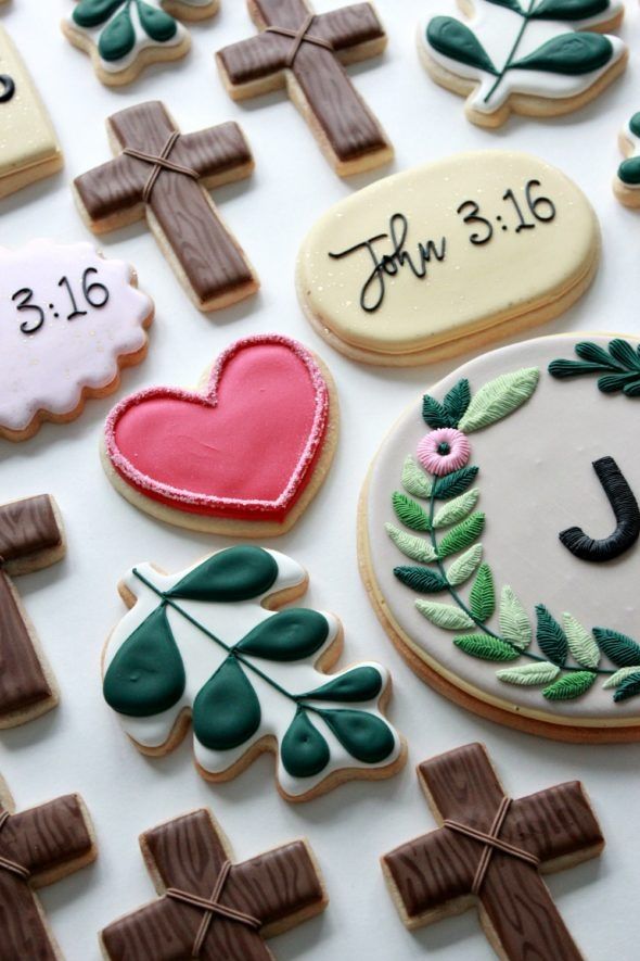 Intricately Designed Decorative Cookies: A Vibrant Assortment of Religious and Nature-Inspired Motifs.