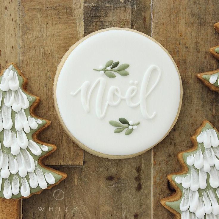 Elegant Holiday Cookie Display with Smooth Icing and Festive Tree Designs.