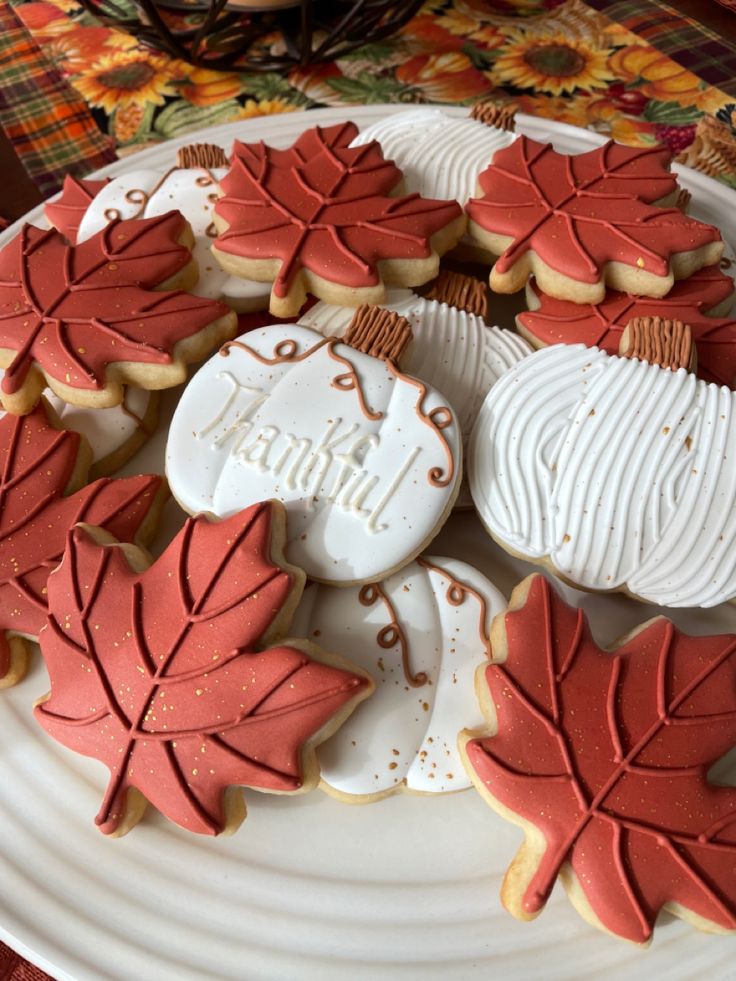 Elegant Autumn-Inspired Cookies with Intricate Designs and Warm Tones.