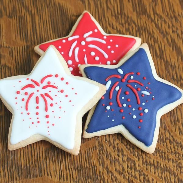 Patriotic Star-Shaped Cookies with Firework Icing Inspire Themed Celebrations and Nail Art.