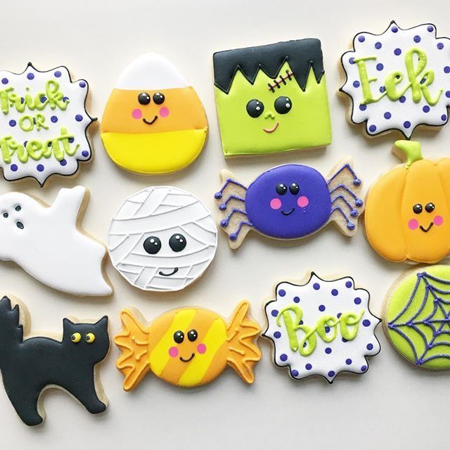 Whimsical Halloween Cookie Assortment with Adorable Designs and Vibrant Colors.