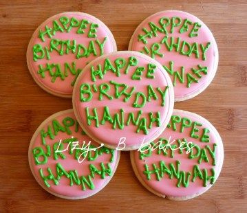 Cheerful Birthday Cookies on Pink Background with Playful Green Icing