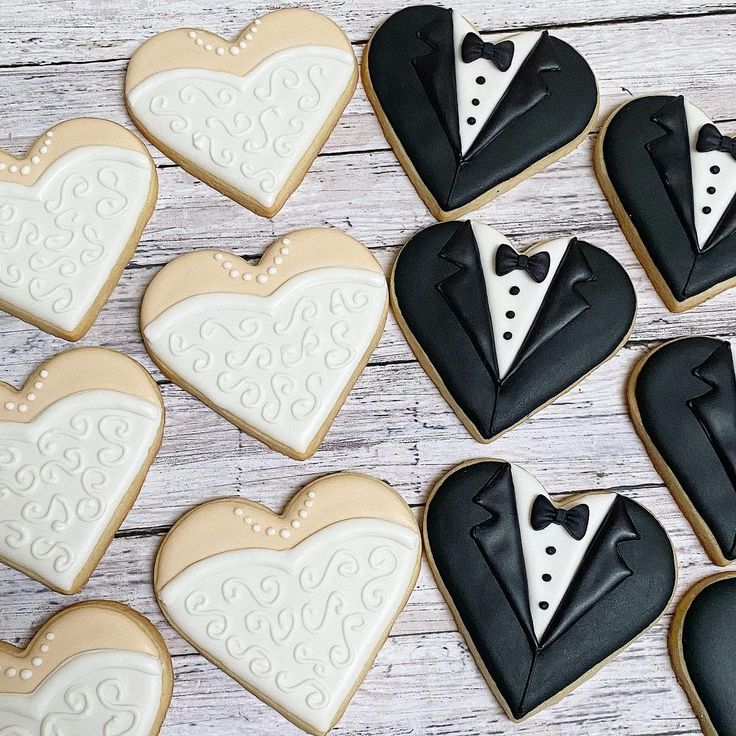 Charming Heart-Shaped Wedding Cookies in Tuxedo and Dress Designs Celebrate Love and Unity.