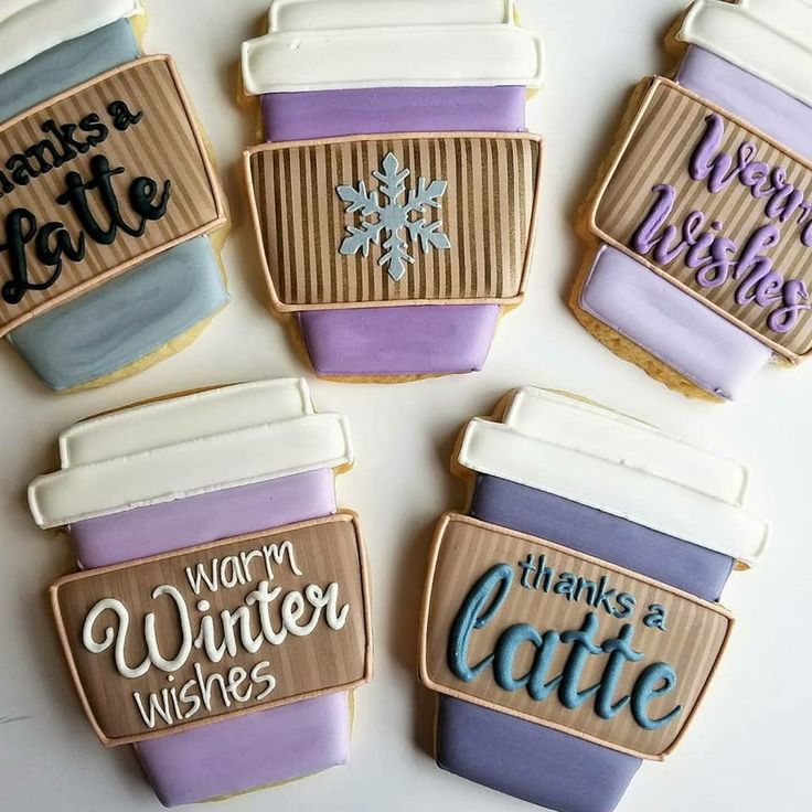 Cozy Winter-Themed Decorative Cookies in Warm Hues and Festive Designs.