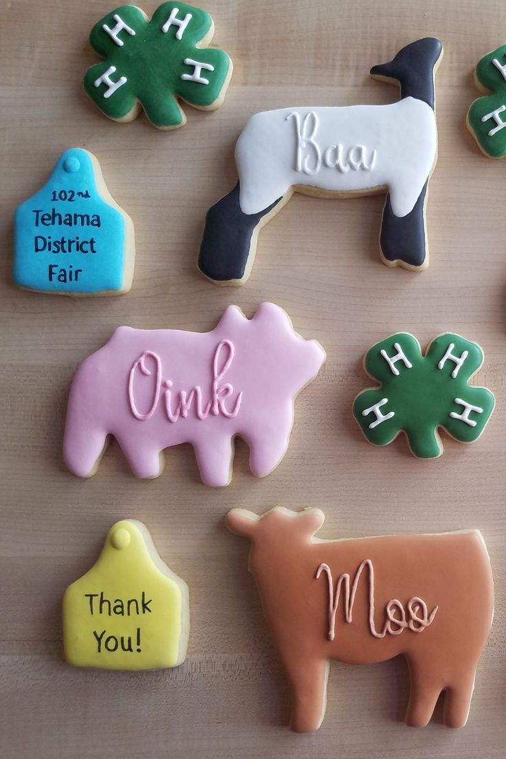 Whimsical Animal-Shaped Cookies with Playful Designs for Festive Celebrations.