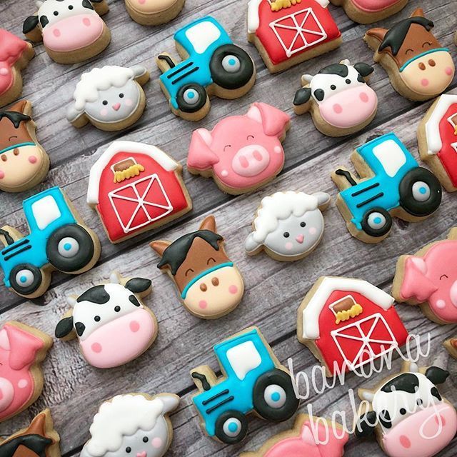 Delightful Barnyard-Themed Cookies Featuring Colorful Animals and Vibrant Farm Equipment.