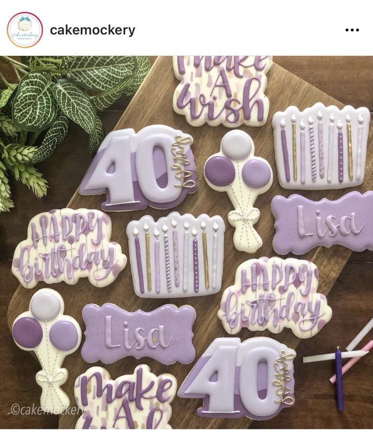 Elegant Decorative Birthday Cookies with Intricate Designs and Soft Color Palette