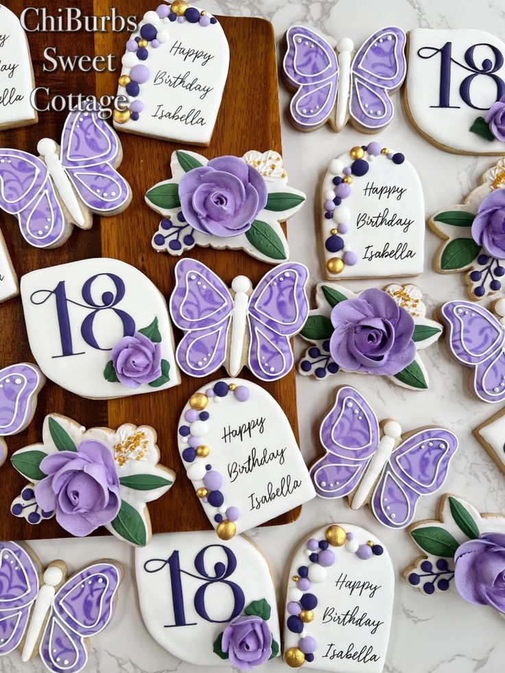 Whimsical Elegant Birthday Cookies with Intricate Floral and Geometric Designs.