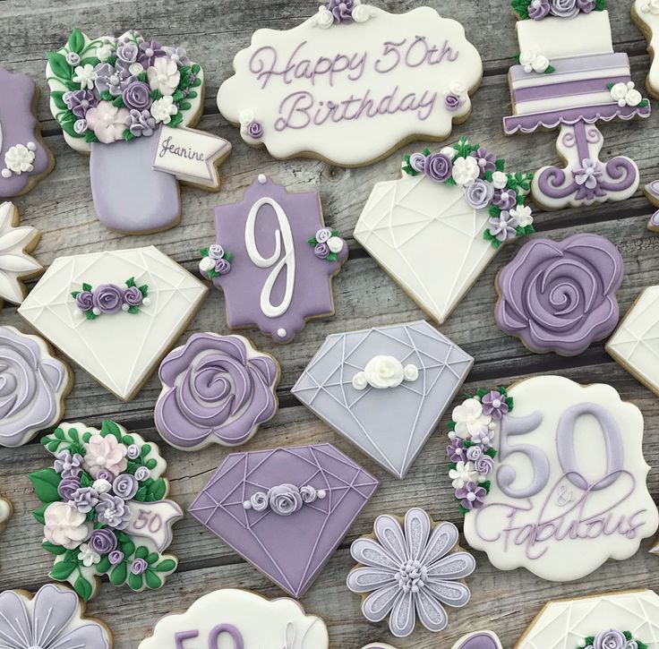 Elegant Purple and White Floral Cookies for a Festive Birthday Celebration.