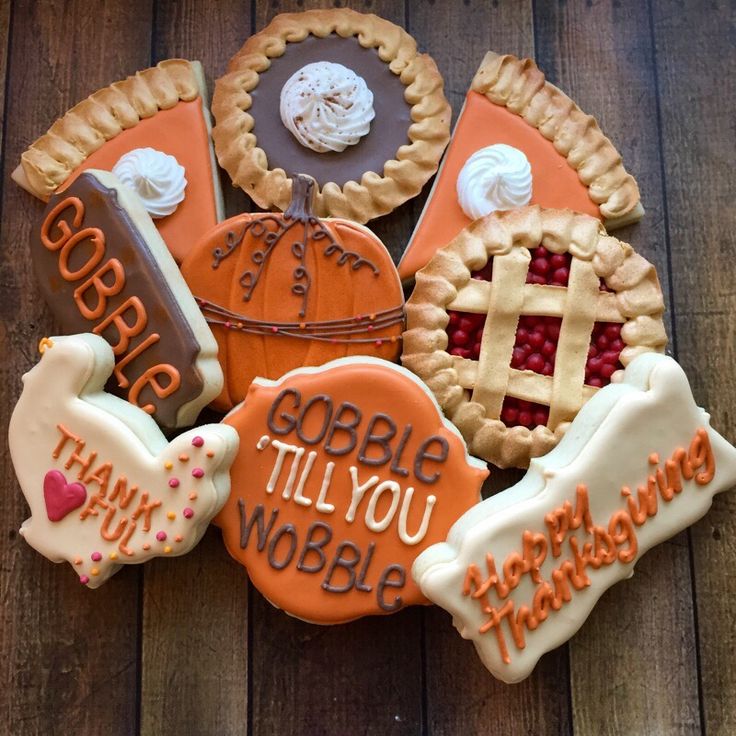 Festive Display of Colorful Thanksgiving-Themed Cookies with Intricate Designs.