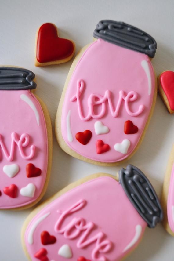 Colorful Heart-Themed Cookie Designs Inspire Whimsical Nail Art.