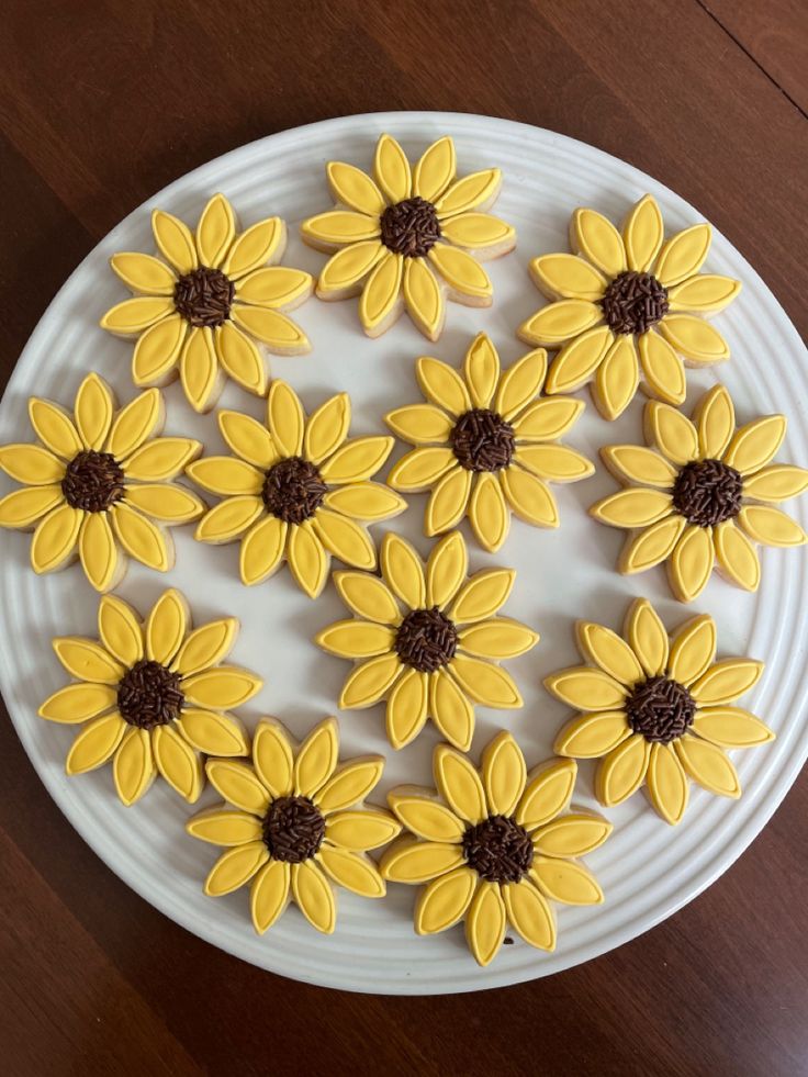 Vibrant Sunflower-Inspired Nail Design: Cheerful Yellow Base with Intricate Brown Accents