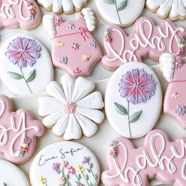 Charming Pastel Floral Cookies: Whimsical Treats for Baby Celebrations.