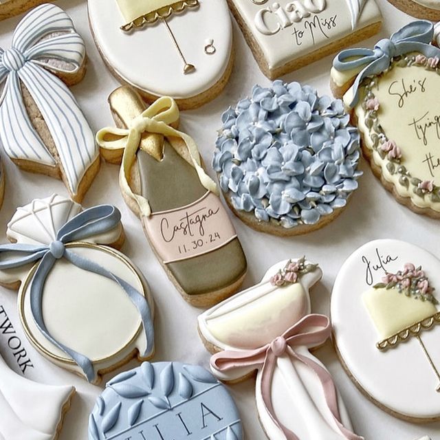 Elegant Pastel Decorative Cookies with Intricate Designs for Special Celebrations.