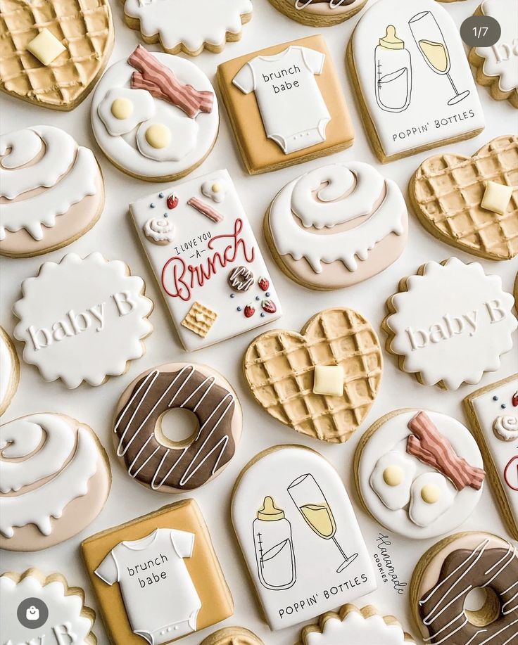 Inviting Brunch-Themed Cookie Display Features Playful Designs and Soft Color Palette.