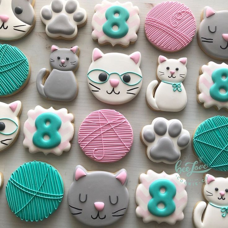 Whimsical Cat and Yarn-Inspired Cookie Designs in Pastel Colors for Cozy Celebrations