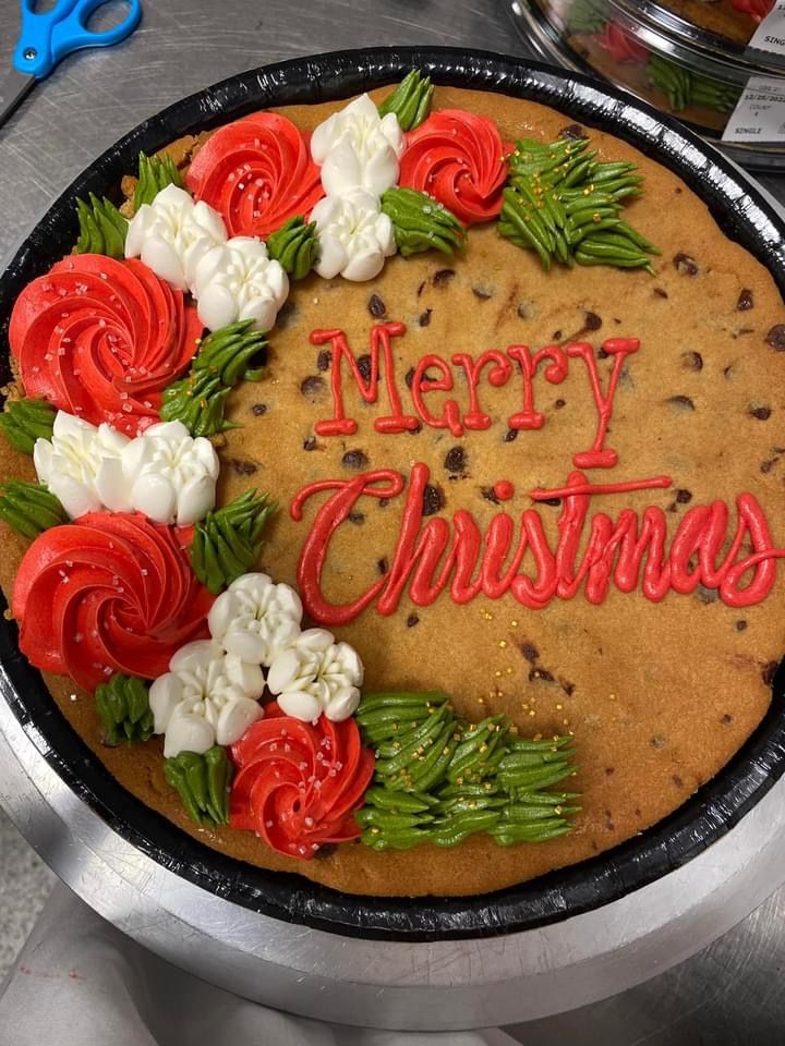 Cheerful Festive Cookie Cake with Vibrant Holiday Decorations.