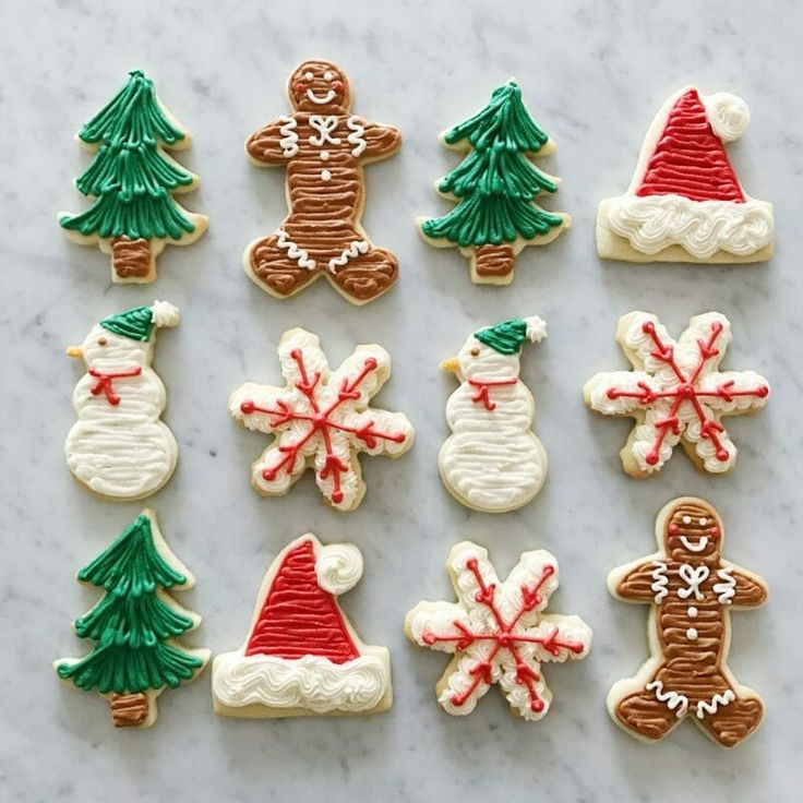 Festive Holiday Cookie Designs with Cheerful Shapes and Intricate Icing.