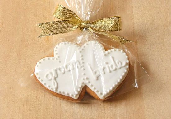 Charming Heart-Shaped Cookies: Elegant Icing Designs for Weddings and Special Events