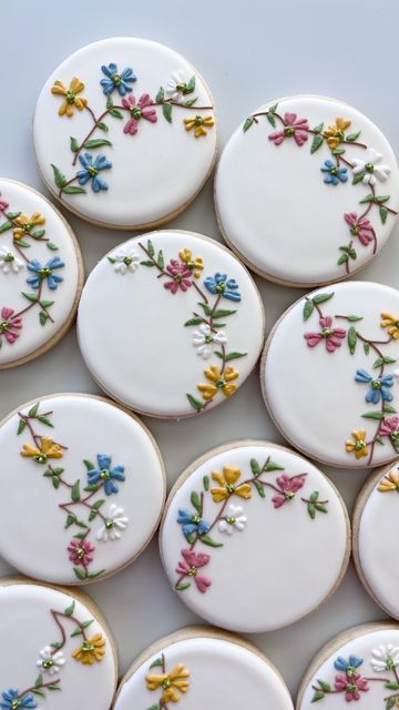 Whimsical Floral Cookies Decorated with Intricate Pastel Icing Designs for Vibrant Celebrations.