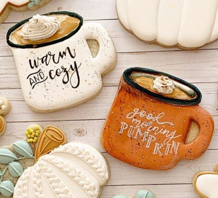 Cozy Fall-Themed Mug Cookies with Whipped Cream and Festive Pumpkin Decor