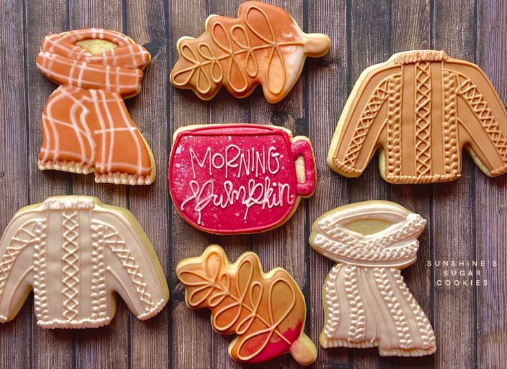 Cozy Autumn-Inspired Cookie Designs with Sweater and Leaf Motifs