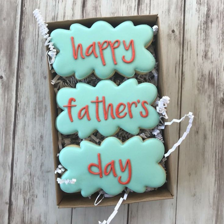 Pastel Blue Cloud-Shaped Cookies with Vibrant Lettering for Festive Celebrations