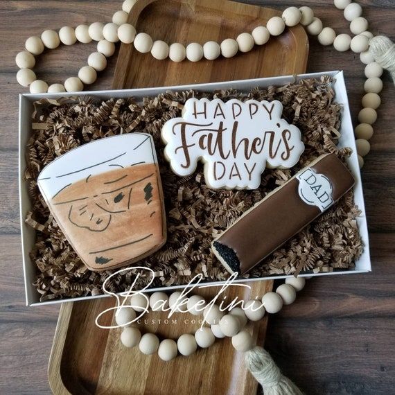 Elegant Father's Day Gourmet Cookie Gift Set with Whiskey Glass and Tie Designs.