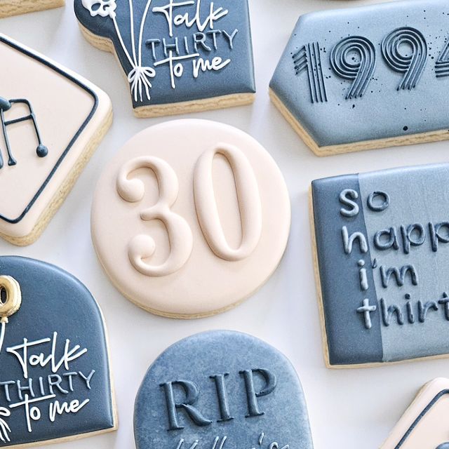 Playful 30th Birthday Decorative Cookies with Humorous Designs and Pastel Hues.