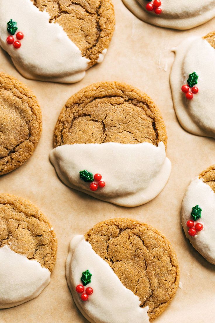 Festive Cookies with Creamy Glaze and Holly Berry Accents for Holiday Cheer.