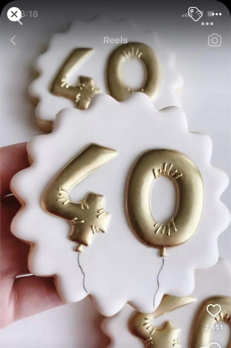 Elegant Golden Balloon Number Cookies for Celebratory Milestones.