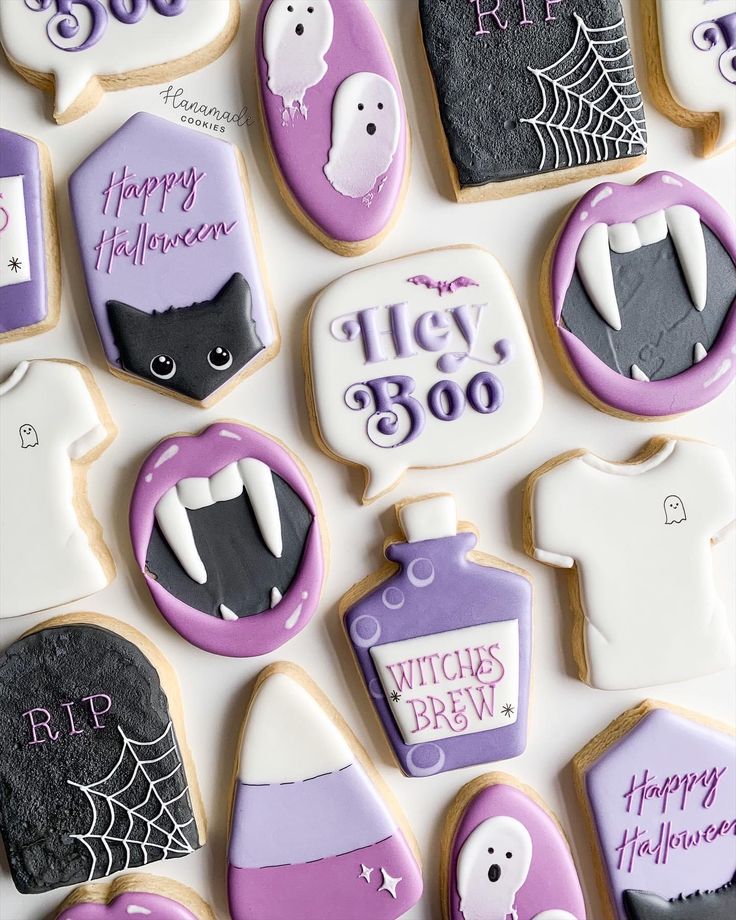 Playful Halloween Cookies Featuring Spooky Designs in Vibrant Colors.