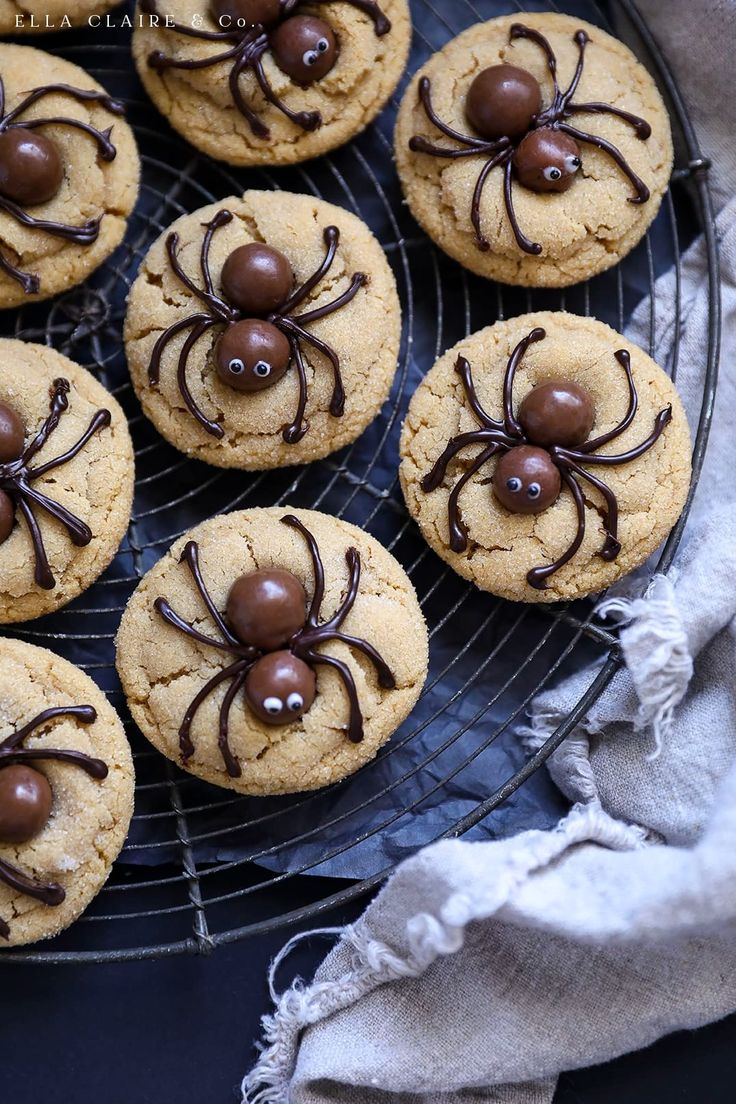 Creative Spider-Themed Cookies with Chocolate Drizzle and Edible Eyes