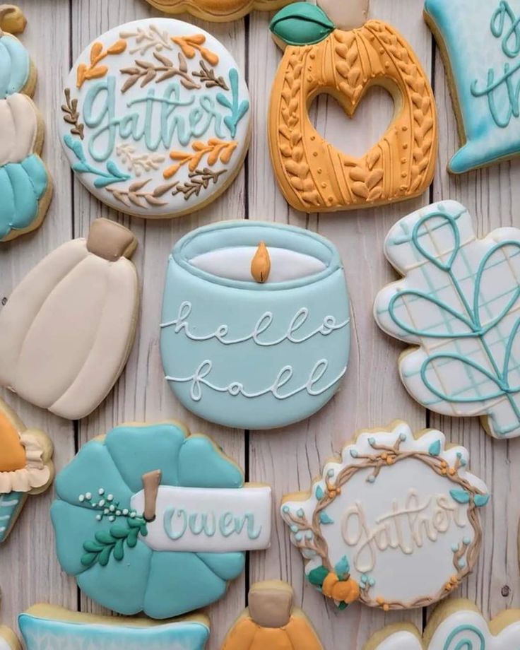 Vibrant Autumn-Inspired Cookie Designs Featuring Pumpkins, Leaves, and Candles.