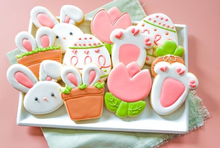 Charming Pastel Easter Cookies with Bunny, Flower, and Egg Designs for Spring Celebrations.