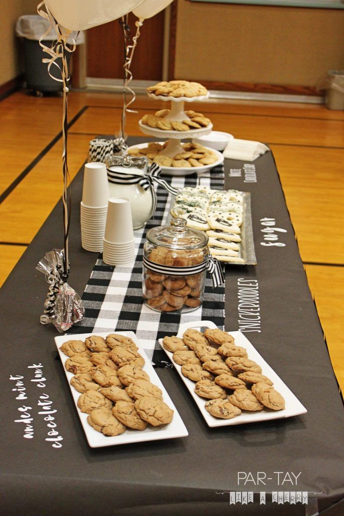 Charming Dessert Table Display with Elegant Cookie Arrangement and Festive Accents.