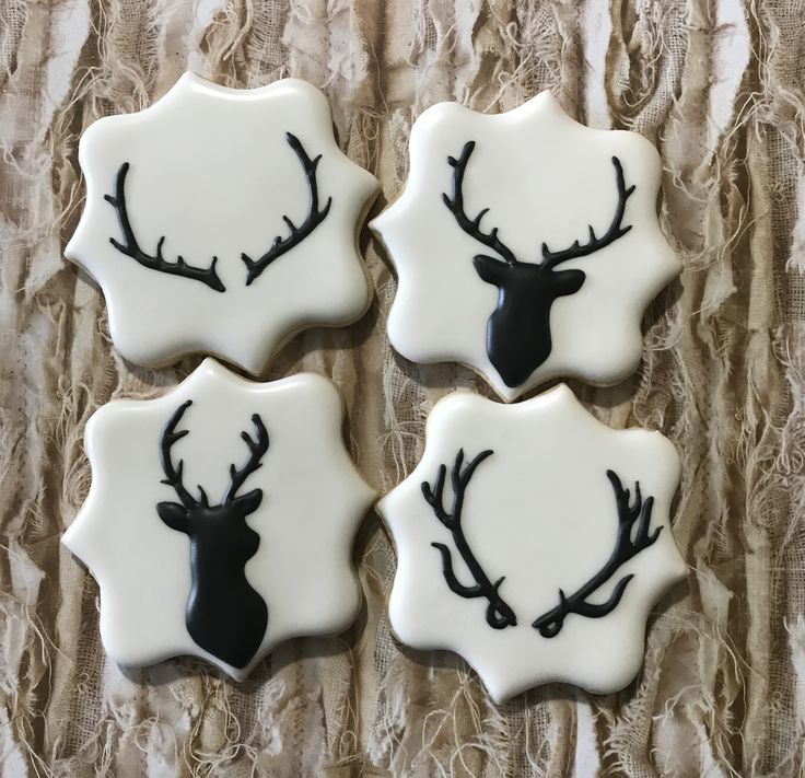 Elegant Reindeer Motif Cookies: Seasonal Delights with Striking Contrast.