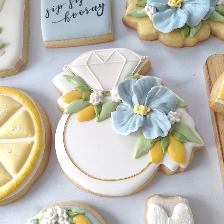 Elegant Floral Cookie Designs Featuring a Diamond Ring Motif.