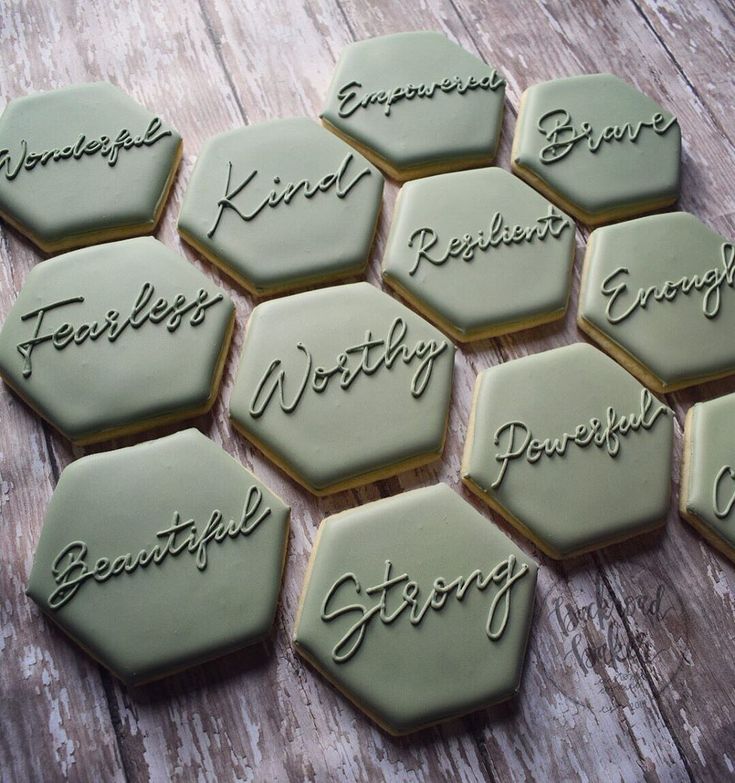 Elegant Hexagonal Cookies with Positive Affirmations Inspire Stunning Nail Art Designs.