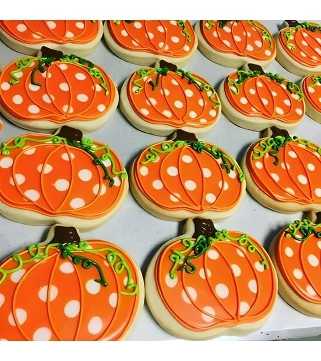 Whimsical Pumpkin-Shaped Cookies: Vibrant Autumn Treats Inspiring Festive Nail Designs.