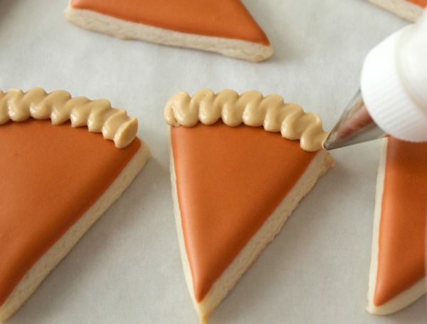 Autumn-Inspired Decorative Cookies with Pumpkin Flavors and Whimsical Designs.